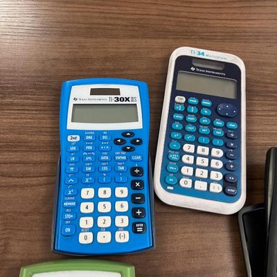 5 Texas Instrument Calculators  - Conference Room