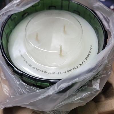 Sale Photo Thumbnail #790: Unopened except for the one I opened to photograph and collectable. One box may not be Elton John candles but ot is the same kind of 3 wick candle