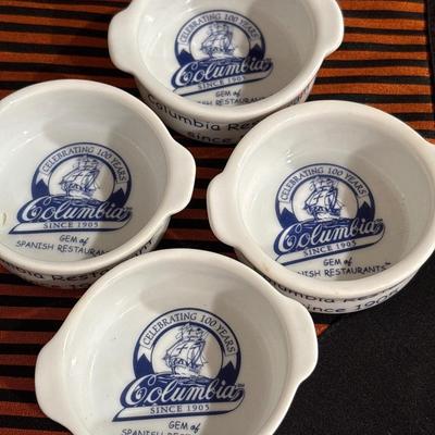 Large white ceramic pitcher and four Columbia dipping dishes