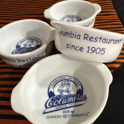 Large white ceramic pitcher and four Columbia dipping dishes