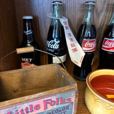 Coca-Cola and Stewart’s root beer bottles, crock, tea cups,