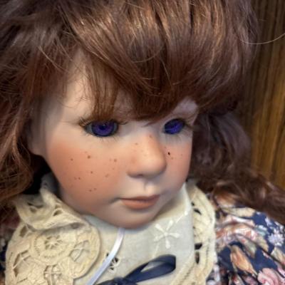 Large porcelain dolls (redhead was $400)
