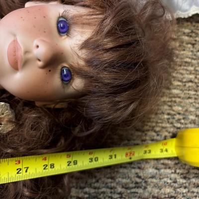 Large porcelain dolls (redhead was $400)