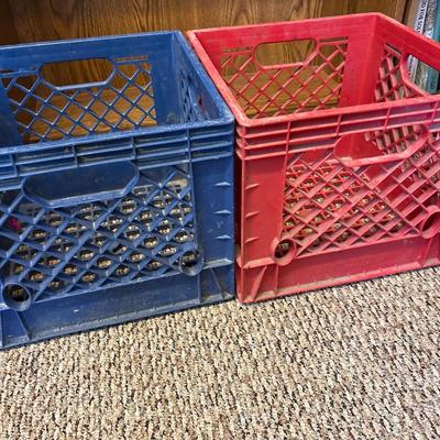 Blue Land O Lakes and red Marigold Foods crates