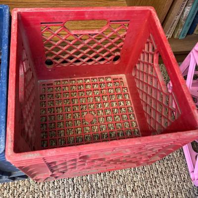 Blue Land O Lakes and red Marigold Foods crates