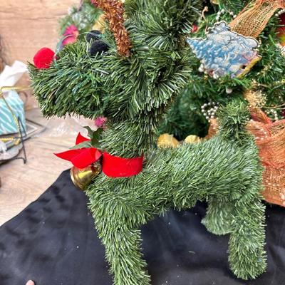 3 wreaths and a deer