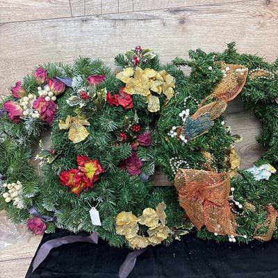 3 wreaths and a deer