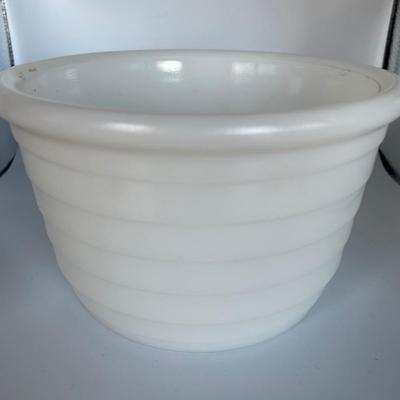 White milk glass mixing bowl with green depression glass cup and blue fiesta style cup