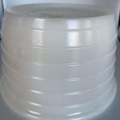 White milk glass mixing bowl with green depression glass cup and blue fiesta style cup