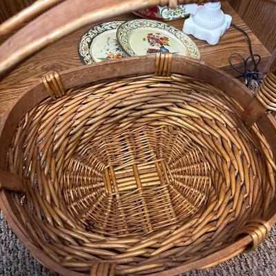 Large basket, milk glass lamp, metal trays, and sled