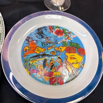 Silver rimmed stemware, Hawaii and Florida plates