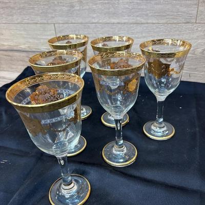 6 gold rimmed stemware