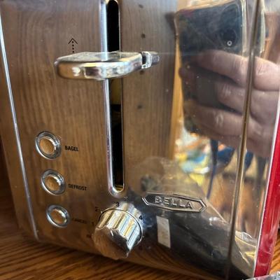 Iridescent bowl, Bella toaster, and four garlic presses