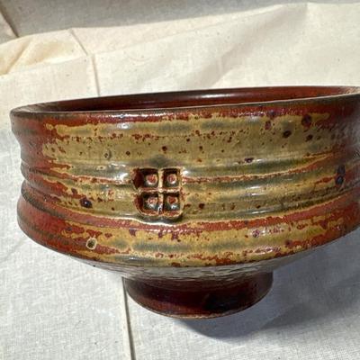 Artist signed pedestal pottery bowl!