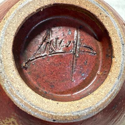 Artist signed pedestal pottery bowl!