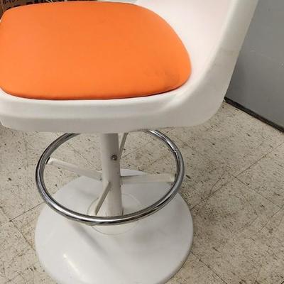 Sale Photo Thumbnail #3: You are bidding on one stool! There are 5 available. Arthur Umanoff designed with new orange upholstery. These are adjustable to 4 heights between 23" and 29"from floor to seat. This listing is the stool marked #1