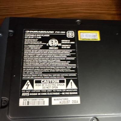 Portable DVD player with cords, microphones, and more