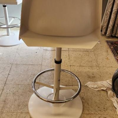Sale Photo Thumbnail #30: You are bidding on one stool! There are 5 available. Arthur Umanoff designed with new orange upholstery. These are adjustable to 4 heights between 23" and 29"from floor to seat. This listing is the stool marked #3