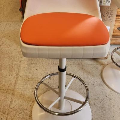 Sale Photo Thumbnail #38: You are bidding on one stool! There are 5 available. Arthur Umanoff designed with new orange upholstery. These are adjustable to 4 heights between 23" and 29"from floor to seat. This listing is the stool marked #4