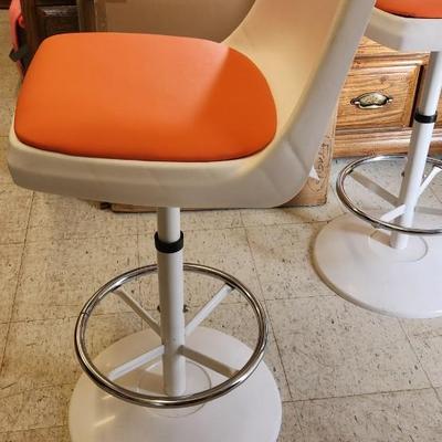 Sale Photo Thumbnail #39: You are bidding on one stool! There are 5 available. Arthur Umanoff designed with new orange upholstery. These are adjustable to 4 heights between 23" and 29"from floor to seat. This listing is the stool marked #4