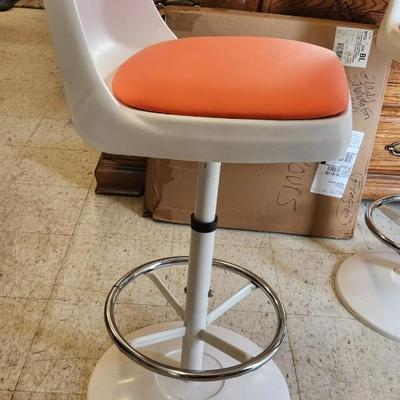 Sale Photo Thumbnail #41: You are bidding on one stool! There are 5 available. Arthur Umanoff designed with new orange upholstery. These are adjustable to 4 heights between 23" and 29"from floor to seat. This listing is the stool marked #4