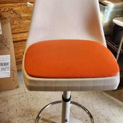 Sale Photo Thumbnail #50: You are bidding on one stool! There are 5 available. Arthur Umanoff designed with new orange upholstery. These are adjustable to 4 heights between 23" and 29"from floor to seat. This listing is the stool marked #5