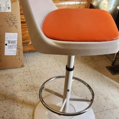 Sale Photo Thumbnail #53: You are bidding on one stool! There are 5 available. Arthur Umanoff designed with new orange upholstery. These are adjustable to 4 heights between 23" and 29"from floor to seat. This listing is the stool marked #5