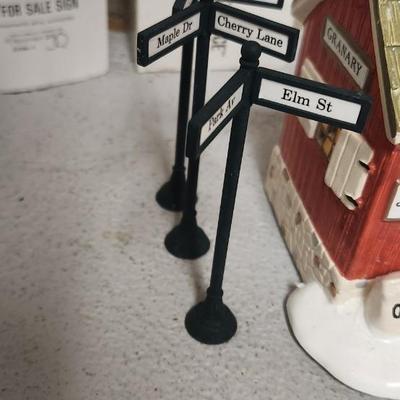 Sale Photo Thumbnail #61: Granary, phone booth, for sale sign, street signs and fence line.