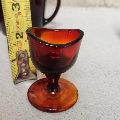 Sale Photo Thumbnail #141: Misc lot of red glass...the scallop, handled bowl is flashed color. The rest are red glass