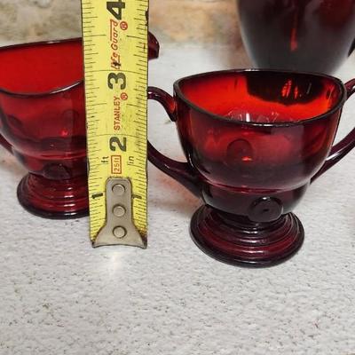 Sale Photo Thumbnail #136: Misc lot of red glass...the scallop, handled bowl is flashed color. The rest are red glass