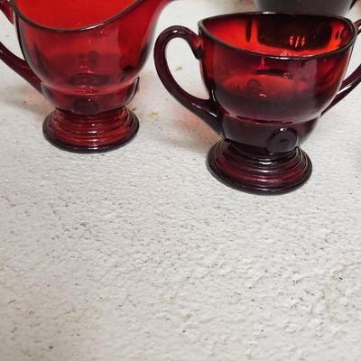 Sale Photo Thumbnail #135: Misc lot of red glass...the scallop, handled bowl is flashed color. The rest are red glass