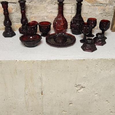 Sale Photo Thumbnail #152: Collection of Avon Cape Cod Ruby Glassware...note the broken stopper. Also, there is still cologne in the candlestick!!!