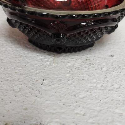 Sale Photo Thumbnail #156: Collection of Avon Cape Cod Ruby Glassware...note the broken stopper. Also, there is still cologne in the candlestick!!!