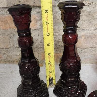 Sale Photo Thumbnail #153: Collection of Avon Cape Cod Ruby Glassware...note the broken stopper. Also, there is still cologne in the candlestick!!!