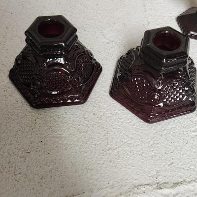 Sale Photo Thumbnail #165: Collection of Avon Cape Cod Ruby Glassware...note the broken stopper. Also, there is still cologne in the candlestick!!!