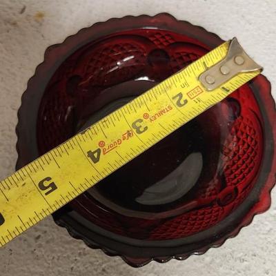 Sale Photo Thumbnail #157: Collection of Avon Cape Cod Ruby Glassware...note the broken stopper. Also, there is still cologne in the candlestick!!!