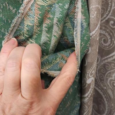 Sale Photo Thumbnail #236: 4 bolts of upholstery fabric.