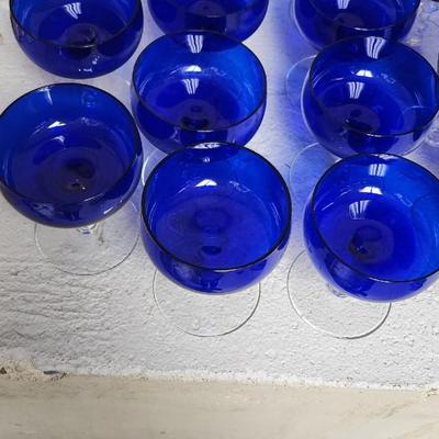 Sale Photo Thumbnail #267: A large mess of cobalt stemware, some chippy