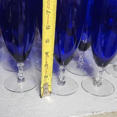 Sale Photo Thumbnail #272: A large mess of cobalt stemware, some chippy