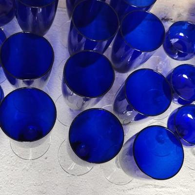 Sale Photo Thumbnail #270: A large mess of cobalt stemware, some chippy