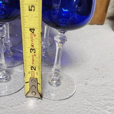 Sale Photo Thumbnail #275: A large mess of cobalt stemware, some chippy