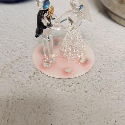 Sale Photo Thumbnail #305: Gorgeous blue chiseled Blessings vase, a very old silver teapot and a sweet blown bride and groom