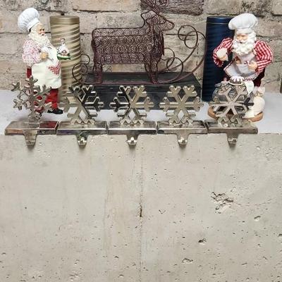 Sale Photo Thumbnail #403: 2 cute kitchen Santa's, a couple tins, stocking hangers and a metal reindeer basket