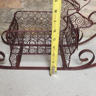 Sale Photo Thumbnail #408: 2 cute kitchen Santa's, a couple tins, stocking hangers and a metal reindeer basket