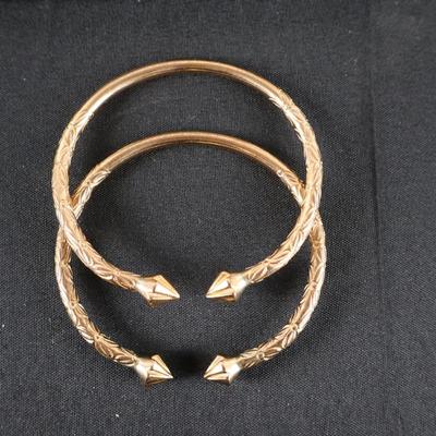 10Kt Gold Bracelets (Pair) - 84.3 grams