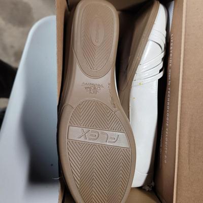 Sale Photo Thumbnail #812: I think neither pair have been worn based on the bottom but the sensible shoes do have something on them, ot looks like drops of ketchup, did wipe off when attempted but I did not clean them