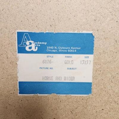 Sale Photo Thumbnail #779: Framed Horse and Rider print.