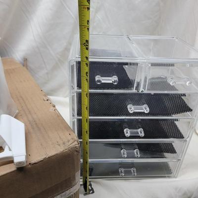 Sale Photo Thumbnail #824: Crockpot is used, carpet cleaning chemicals were still boxed and no cracks in plastic storage drawers assembly