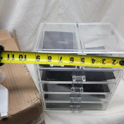 Sale Photo Thumbnail #823: Crockpot is used, carpet cleaning chemicals were still boxed and no cracks in plastic storage drawers assembly