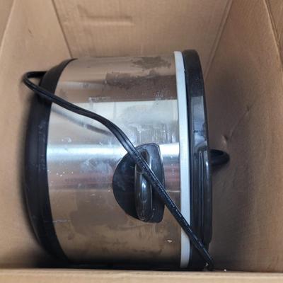 Sale Photo Thumbnail #820: Crockpot is used, carpet cleaning chemicals were still boxed and no cracks in plastic storage drawers assembly